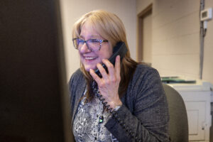 Diane our administrator talking to a client on the phone