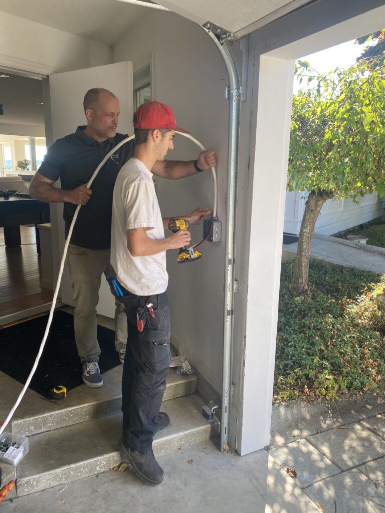 Scott + Dono installing ev charger residential ev charger installation in progress